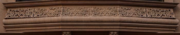 Carved brownstone frieze detail